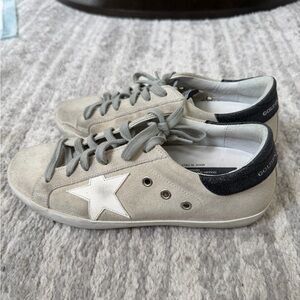 Golden Goose Beige and Black Star Sneakers
